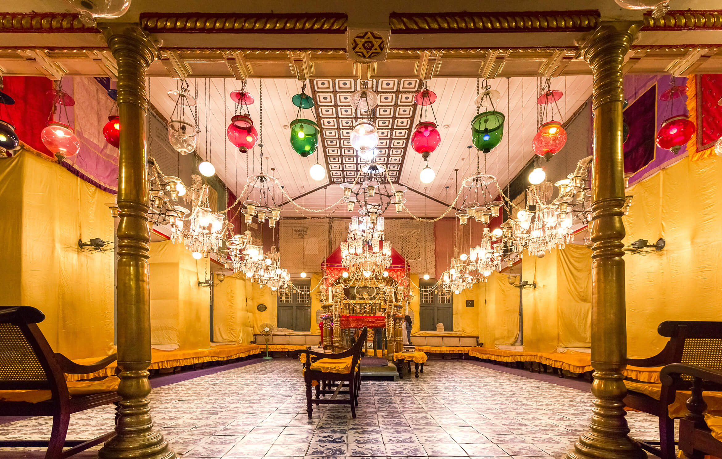 A JEWISH AUTUMN IN KOCHI -The bright and lustrous interior of Paradesi Synagogue on Shmini days.